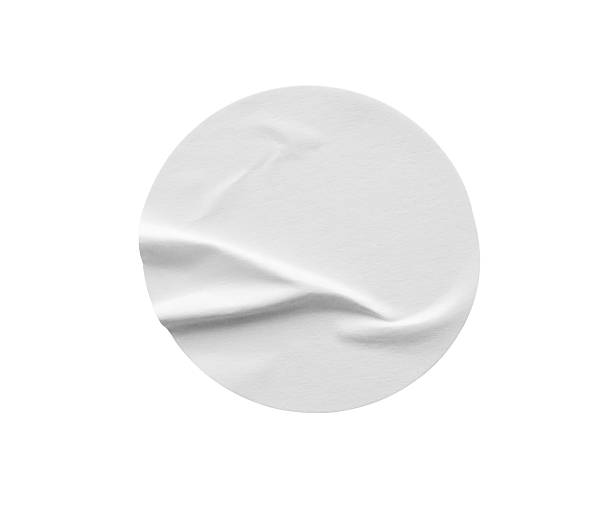 istock Blank white round paper sticker label isolated on white background 2235453679