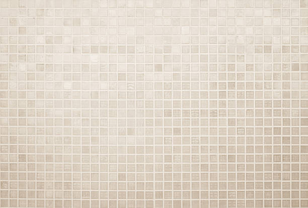 istock Cream ceramic wall and floor tiles mosaic background in bathroom and kitchen. 2235454828