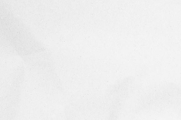 istock White recycled craft paper texture as background with copy space for text. 2235454832