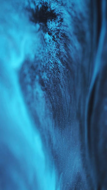 istock Sparkling blend ink emulsion shimmering water flow 2235474378