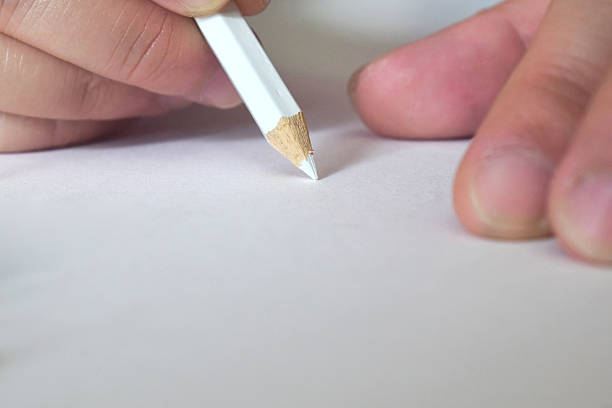 istock An artist or hand is using colored pencils to draw or paint according to their imagination. Using colored pencils to draw, paint, paint. 2235476434