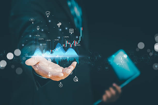 istock Digital Compliance Quality concept with a businessman holding glowing virtual chart in his palm, showing rising financial data, analytics icons, and investment growth for corporate success. 2235479014