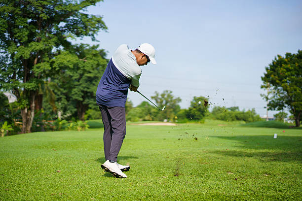 istock Asian golfer playing golf in morning. He playing a tee off shot. 2235482453