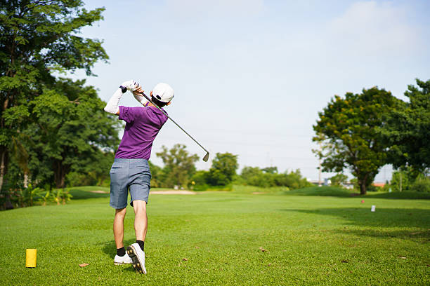 istock Asian golfer playing golf in morning. He playing a tee off shot. 2235482461
