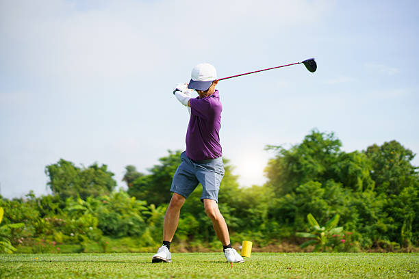 istock Asian golfer playing golf in morning. He playing a tee off shot. 2235482466