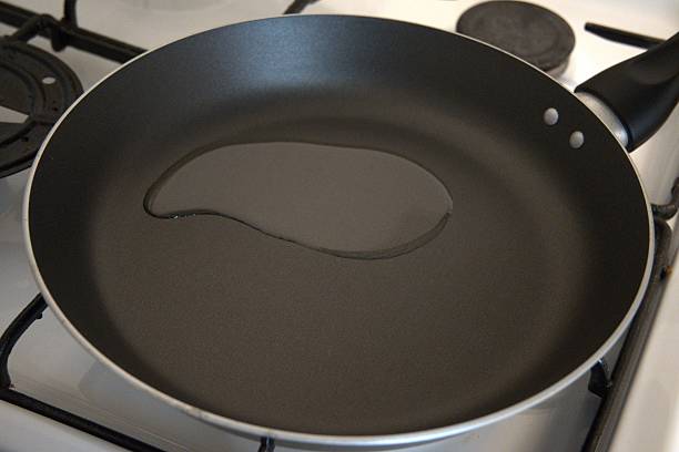 istock Oil in an empty frying pan 2235484884