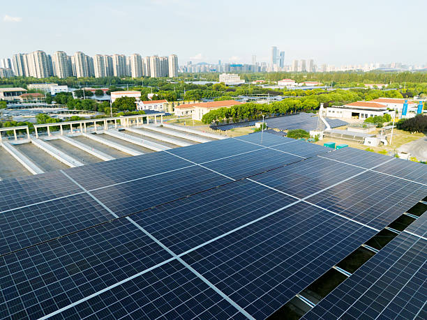 istock Solar Panels on modern city roof 2235489076