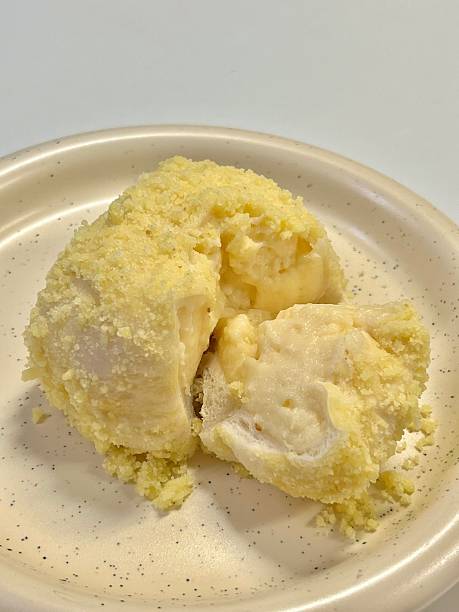 Soft and fluffy cream bread () filled with sweet, silky cream, offering a perfect bite of pillowy texture and rich, creamy indulgence in every delightful mouthful.