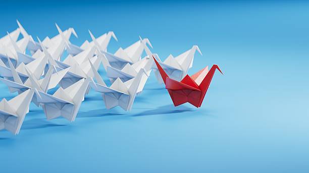 istock Different business concept.new ideas. paper art style. creative idea.Red and white paper swan. leader swan concept.3D rendering on blue background. 2235494792