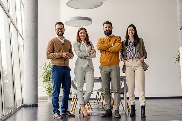 istock Confident Business Team Smiling in Stylish Office Setting with Bright and Modern Interior 2235499358