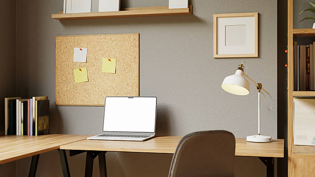 istock 3D rendered modern home office with laptop desk lamp, cork board, and bookshelf 2235499716