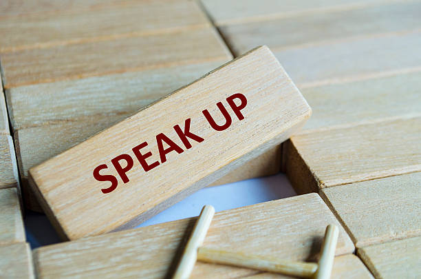 istock A wooden block featuring SPEAK UP on ladder concept highlighting openness, transparency and communication importance. 2235500958