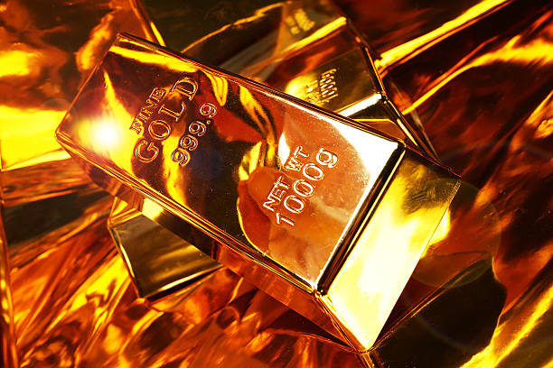 istock Two gold bars on a golden background 2235503457