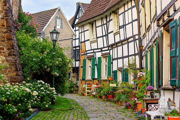 istock Charming Cobblestone Alleyway in Hattingen Germany with Traditional Architecture 2235504402