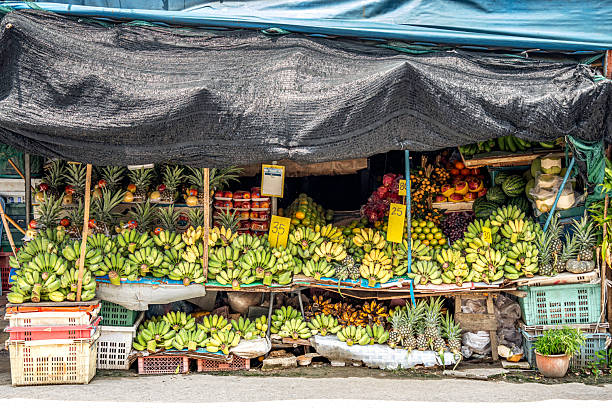 istock Outdoor tropical fruit stall. 2235508258