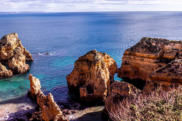 istock Ponta da Piedade cliffs, Algarve, Portugal 2235513055