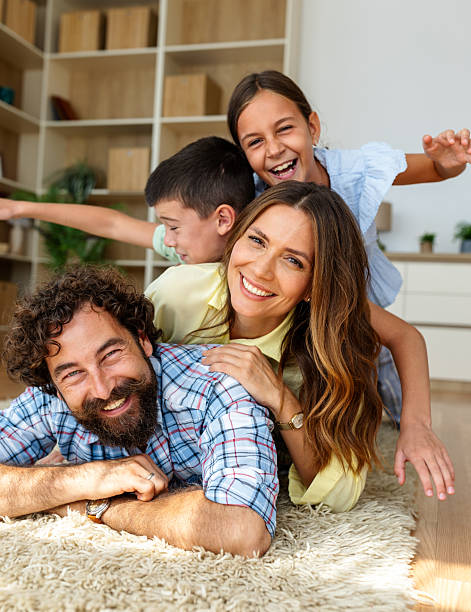 istock Family having fun in living room 2235522465