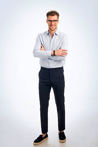 istock Studio portrait of confident young man standing against isolated background 2235522703