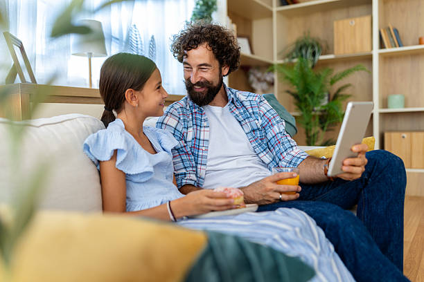 istock Father and daughter share cozy afternoon 2235522969