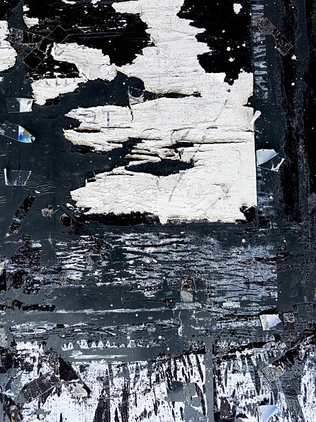 istock Old grunge ripped, torn vintage posters creased crumpled paper surface texture background 2235528394