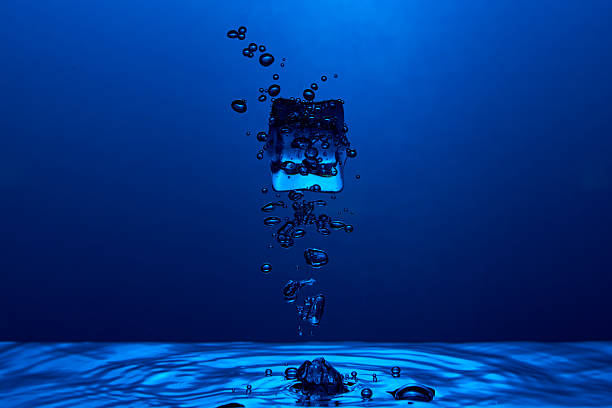 Close up view of running water under water surface.