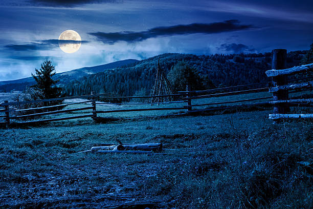 istock mountainous rural landscape in autumn at night 2235533544