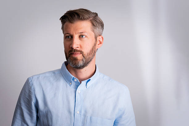 istock Studio shot of a middle aged man standing against isolated background 2235535308