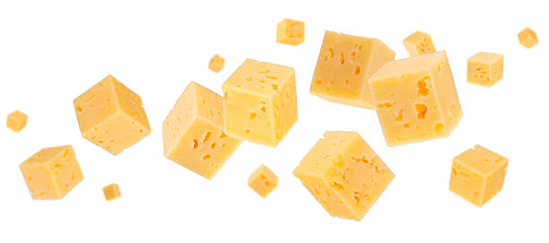 istock Cubes of regular cheese fly and levitate in space. Isolated on white. 2235536712