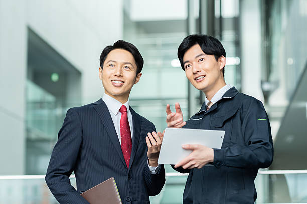 istock Middle-aged businessman having a meeting in the office 2235542009