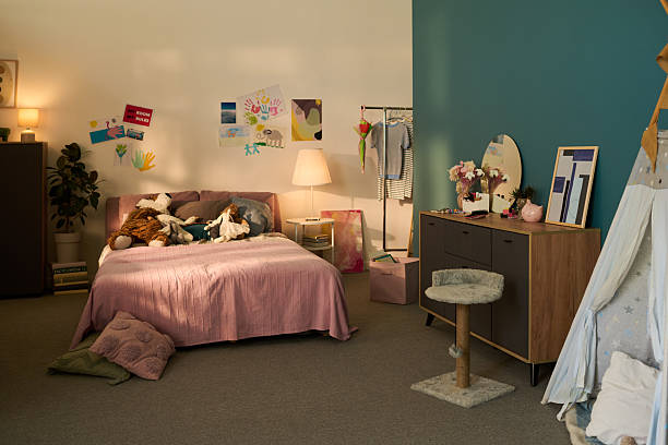 istock Interior of Cozy Decorated Bedroom with Soft Lighting 2235542973