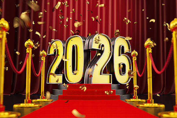 istock New Year Celebration Event 2026 Neon Sign on Red Carpet with Confetti 2235544845
