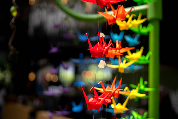 Colorful traditional one thousand Japanese origami paper cranes
