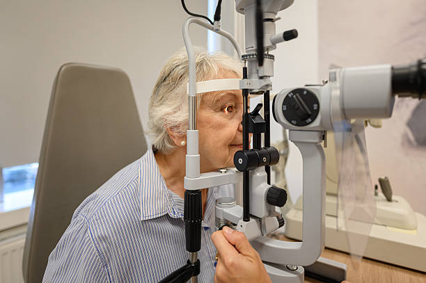 istock Senior woman undergoing eye examination with slit lamp for clear vision checkup at ophthalmology clinic 2235552131