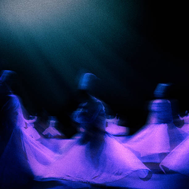 Religious praying event of blurred motion Whirling Sufi Dervishes called ´´Sema´´ in public religious building called ´´Dergah´´ in Konya, Turkey.