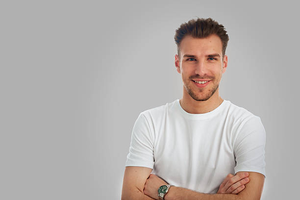 istock Portrait of young man on light gray background 2235554792