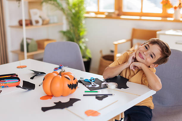 istock Smiling Boy and  his Halloween Crafts 2235562772