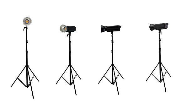 istock Set of professional studio lighting equipment with a tripod isolated over a white background 2235564820