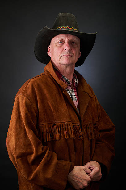 istock Portrait of a serene aged cowboy trapper in studio 2235565071