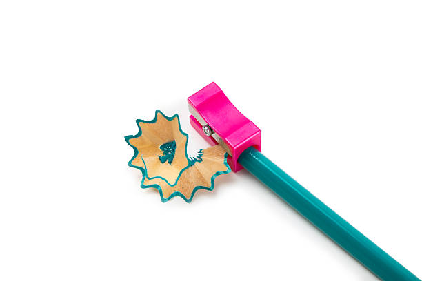 istock Pencil sharpener on bright colored background. Pencil and pencil shavings. Stationery. School supplies. School products. Flat lay. Place for text. copy space. 2235565417