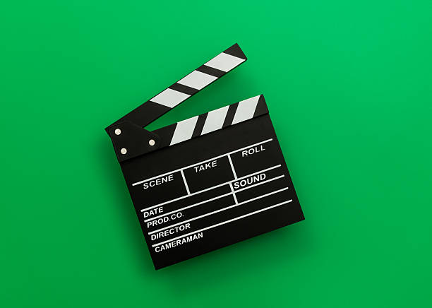 Film slate on green background