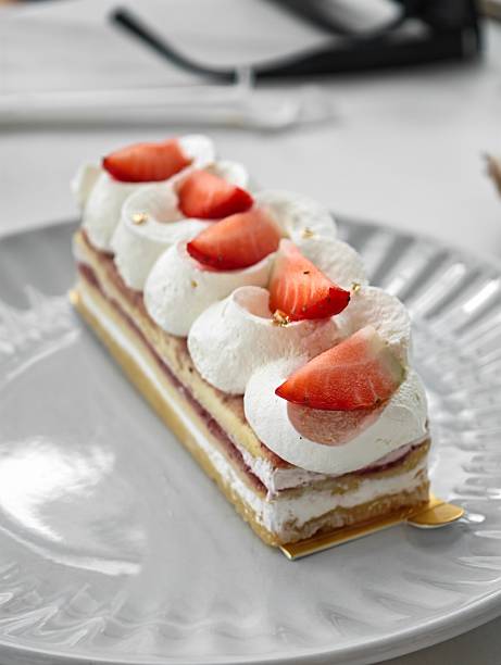 istock One Japanese strawberry shortcake on a stylish large plate on a white table 2235569166