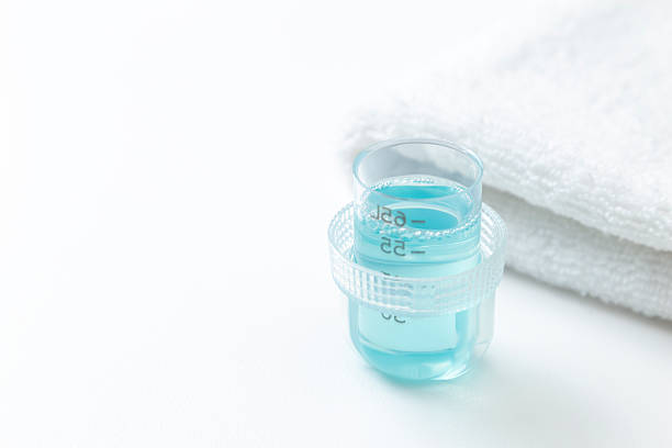 istock Laundry detergent and towels on white background. 2235571851