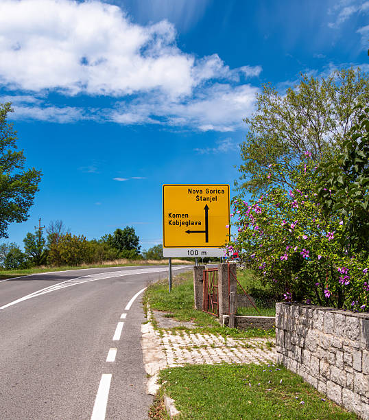 istock Road Sign with Directions to Nova Gorica and Stanjel 2235573892