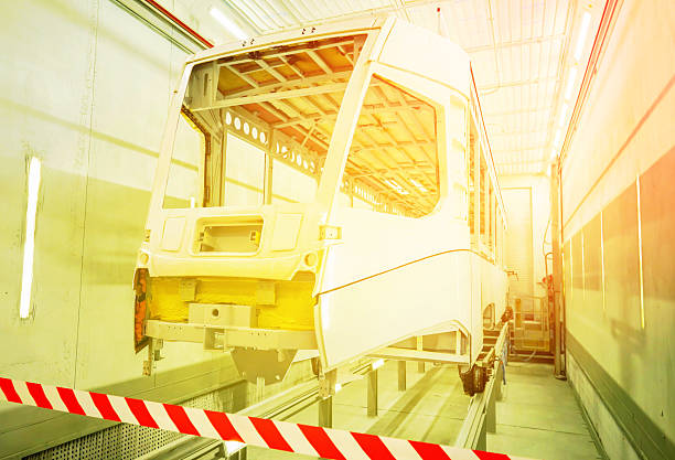 Spray paint shop for tram carriages. Train Paint Booth Painting Chamber For Railway Carriage. Railway Paint Both. Inside of rail car assembly plant, paint shop. Tram workshop production.