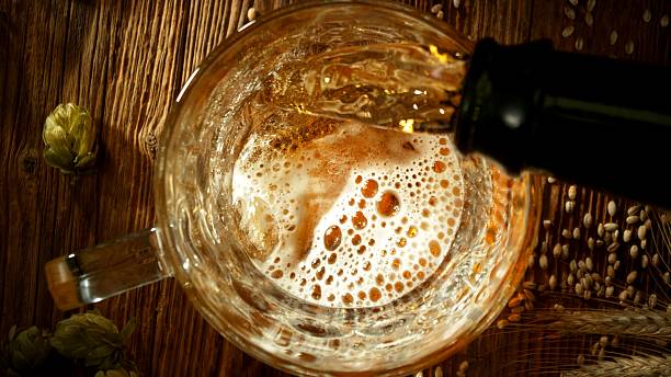 istock Pouring Beer into Pint Glass 2235579393