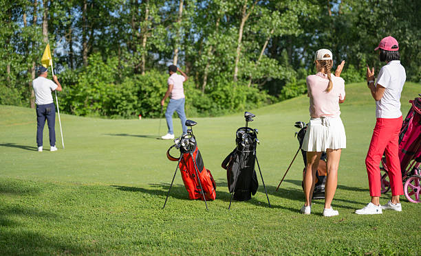 istock Group Of Friends Playing Golf On A Sunny Day 2235579690