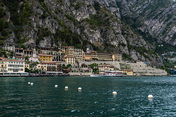 Autumn Garda lake Mountains and Boat View in Riva del Garda, Trentino-South Tyrol, Italy