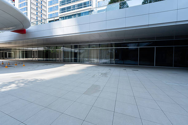 istock road with modern office building in city 2235586971
