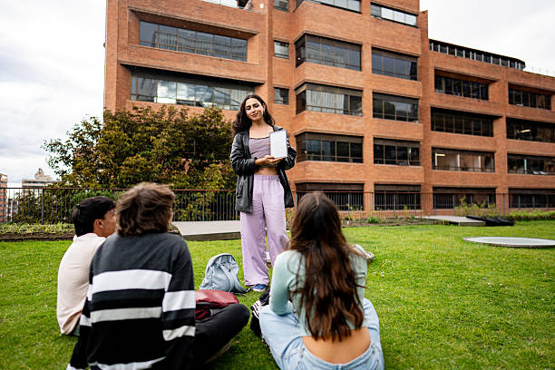 istock Transgender female talking with friends on university campus 2235588485