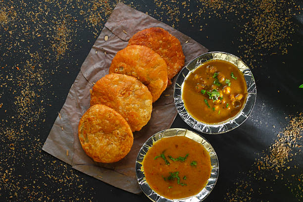istock Traditional Indian Kachori with Aloo Sabzi and Chole 2235589088